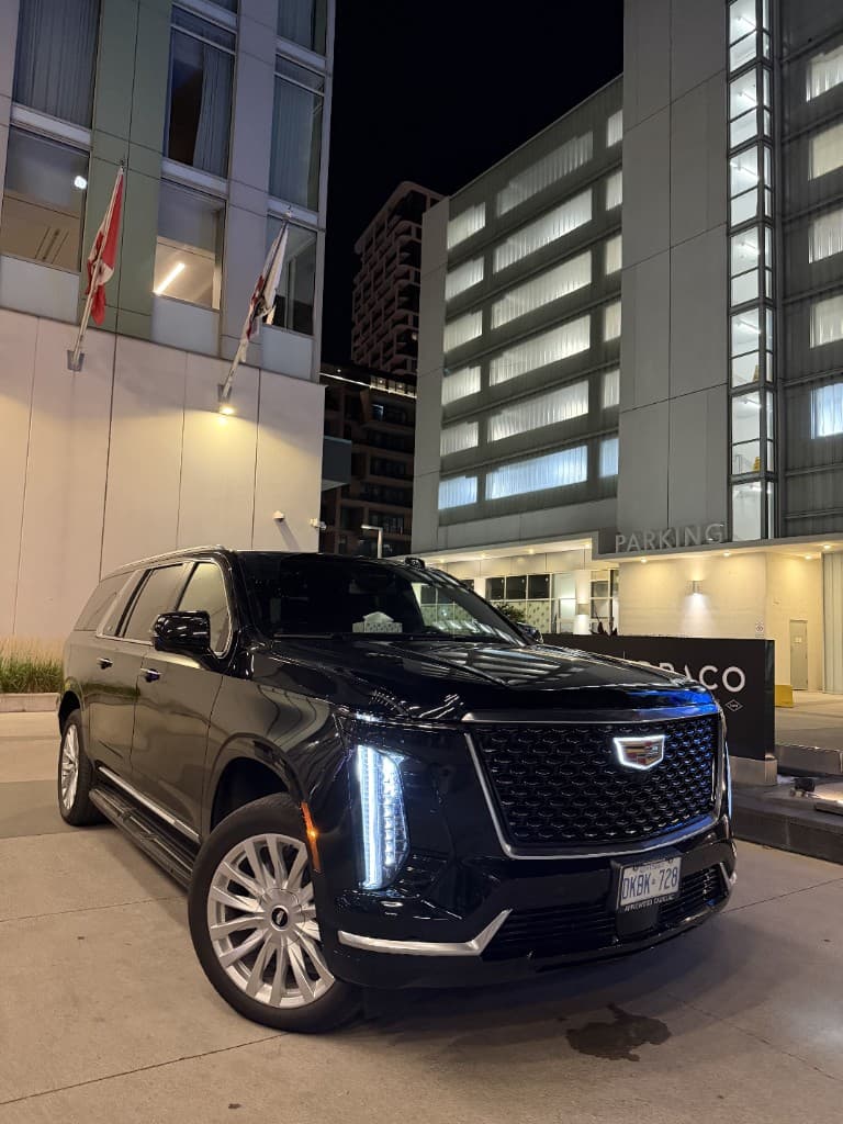 Pearson Limo Escalade luxury SUV parked in Toronto at night