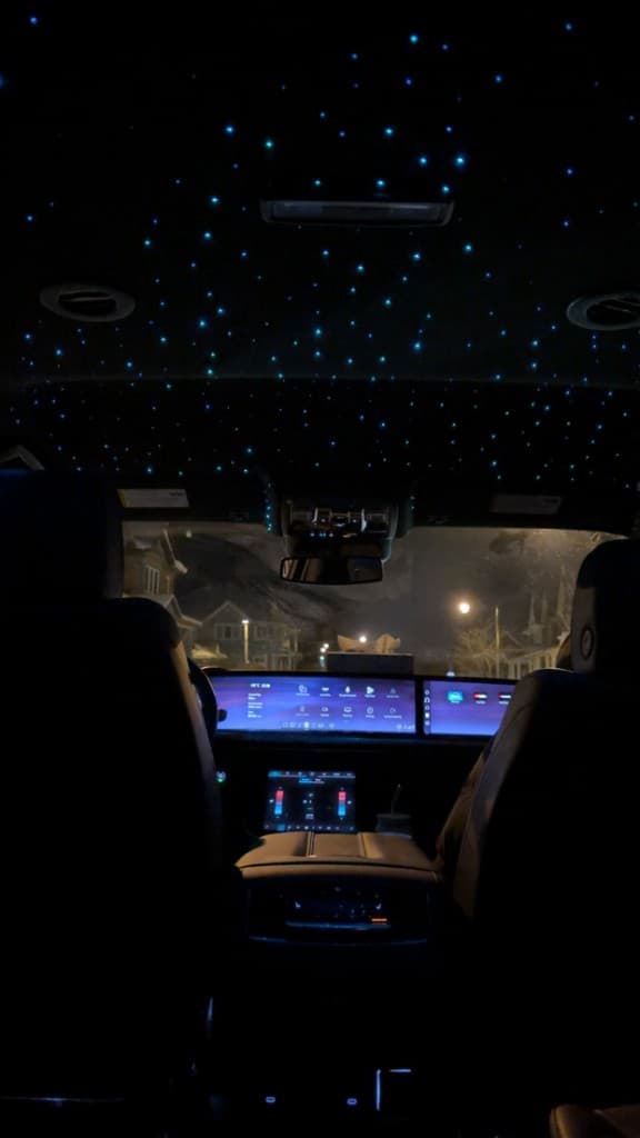 Front cabin digital dash in a Pearson Limo Toronto Escalade